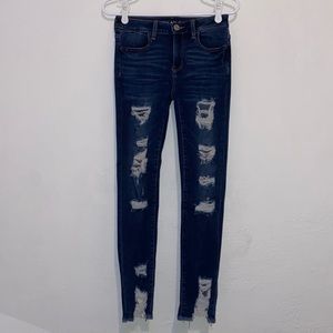 dark blue ripped skinny jeans